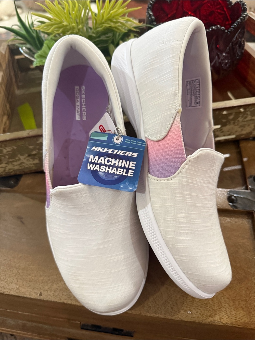 Skechers White Slip-On Sneakers with Pink & Purple Accents